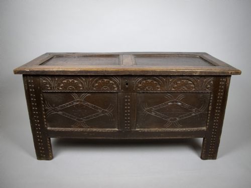 fig 1. 17th Century Carved Oak Coffer With Raised Legs & Original Iron Loop Hinges.