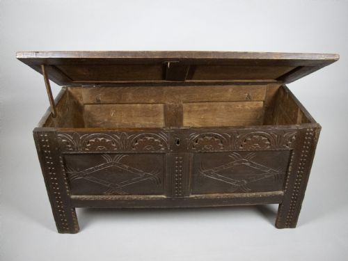 fig 2. 17th Century Carved Oak Coffer With Raised Legs & Original Iron Loop Hinges.