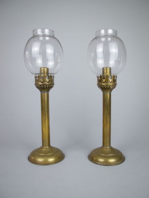 Pair of 19th Century French Brass Gothic Candlesticks with Glass Shades.