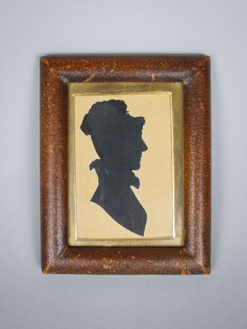19th Century Hand Painted Silhouette of a Woman in Leather Frame