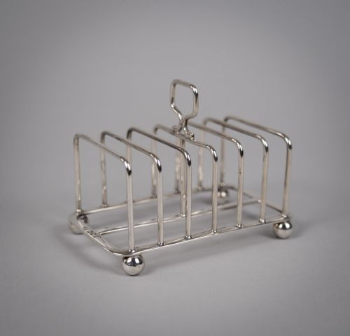 fig 1. Scottish Silver Toast Rack by Robert & William Sorley, Glasgow, 1913.