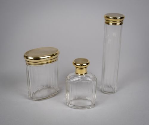 fig 1. B & G West, London, 1942, Three Silver Gilt Dressing Table Jars .