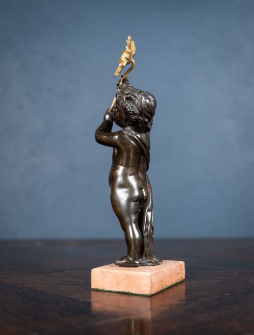 19TH CENTURY BRONZE PUTTO HOLDING A FLOWER - ADDITIONAL PHOTO 5