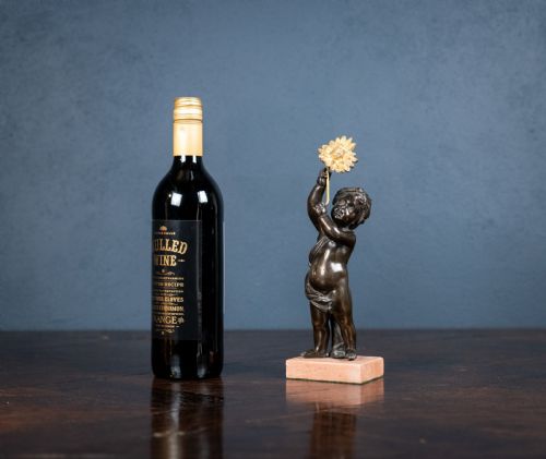19TH CENTURY BRONZE PUTTO HOLDING A FLOWER - ADDITIONAL PHOTO 10