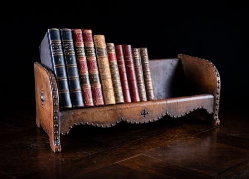 studded tan leather book trough c 1880 - CATEGORY: ANTIQUE BOOKCASES - DATED 1880