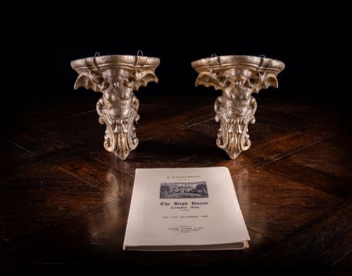 fig 2. A pair of late Victorian gilt terracotta wall brackets shaped as winged sirens with decorative acanthus scrollwork bases.