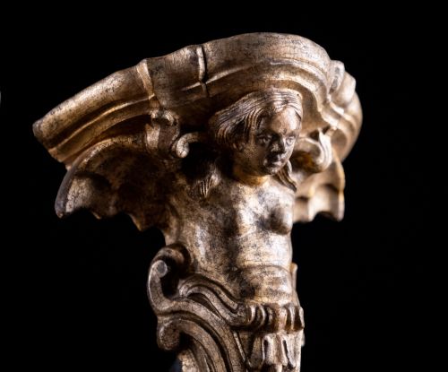 fig 5. A pair of late Victorian gilt terracotta wall brackets shaped as winged sirens with decorative acanthus scrollwork bases.