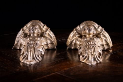 fig 6. A pair of late Victorian gilt terracotta wall brackets shaped as winged sirens with decorative acanthus scrollwork bases.