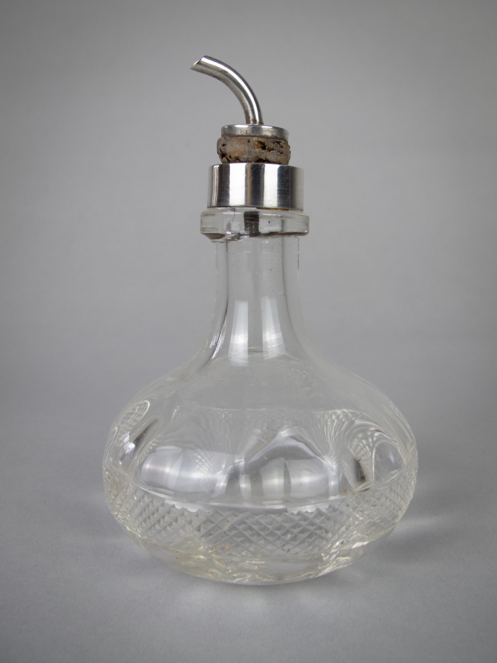 Sterling Silver and Glass Bitters Bottle by John Grinsell & Sons, 1913.
