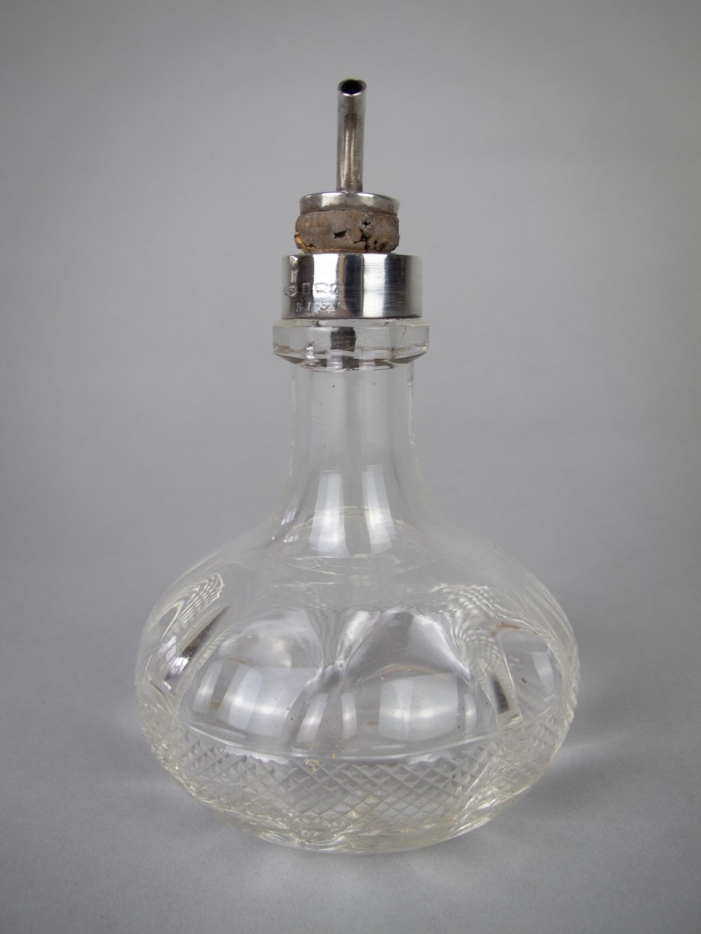 Sterling Silver and Glass Bitters Bottle by John Grinsell & Sons, 1913. View IV
