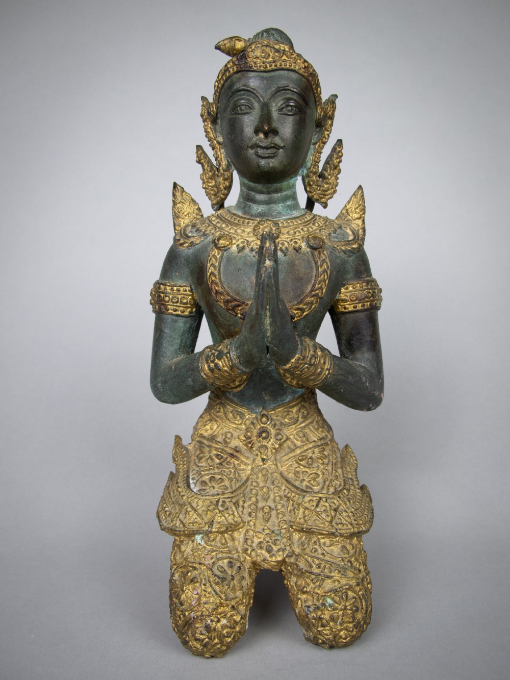 Early 20th Century Gilt Bronze Kneeling Asian Deity.