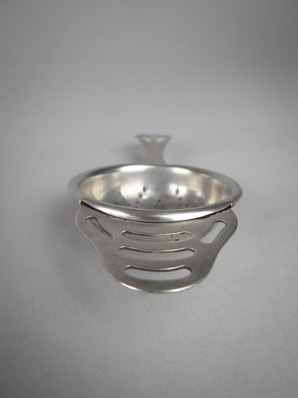 Sterling Silver Tea Strainer by Angora Silver Plate Co, Birmingham, 1932. View IV