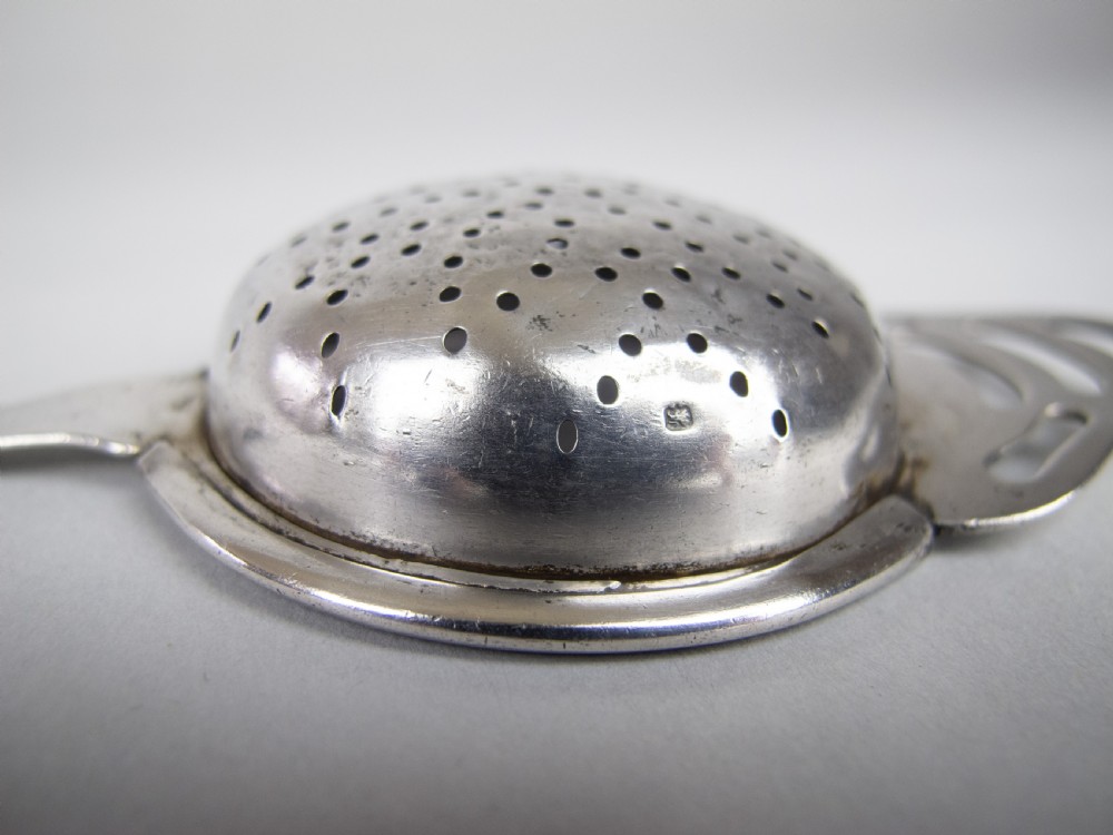 Sterling Silver Tea Strainer by Angora Silver Plate Co, Birmingham, 1932. View VI