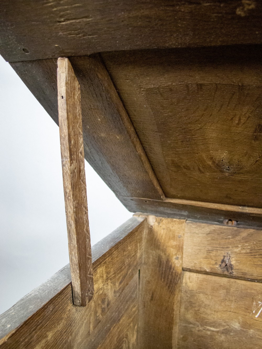 17th Century Carved Oak Coffer With Raised Legs & Original Iron Loop Hinges. View VII