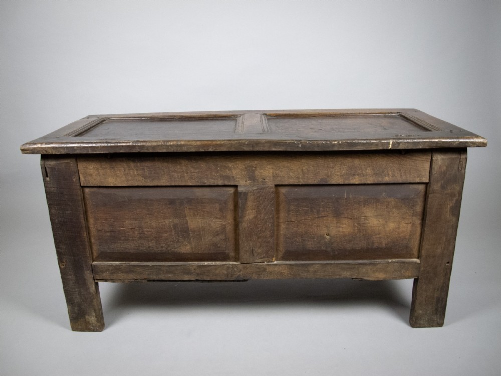 17th Century Carved Oak Coffer With Raised Legs & Original Iron Loop Hinges. View XXIII