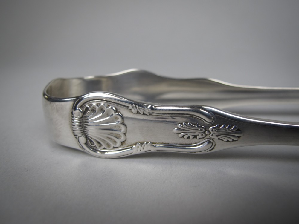 Large Sterling Silver Sugar Tongs. James & William Marshall, Edinburgh, 1840. View IV