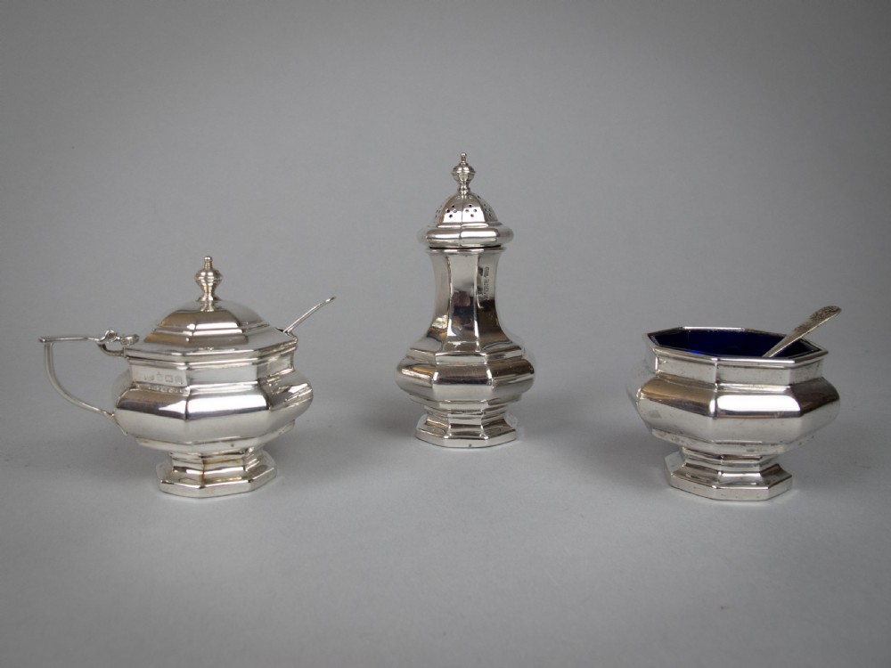 Sterling Silver Three Piece Cruet Set With Spoon by Ernest Druiff & Co, 1925.