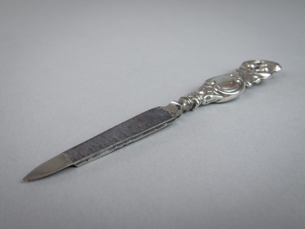 Sterling Silver Nail File by Henry Matthews, Birmingham, 1899. View VII