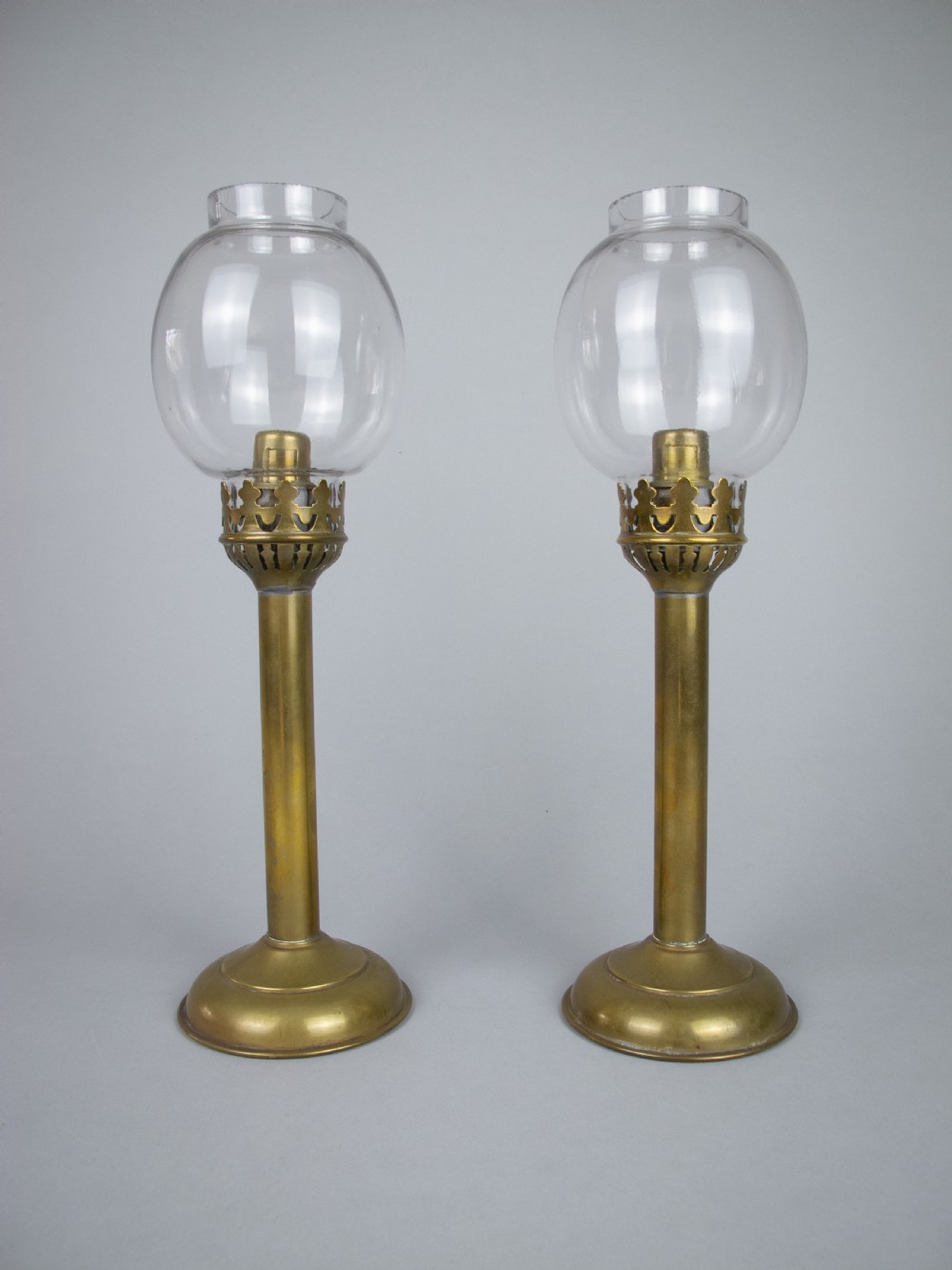 Pair Of 19th Century French Brass Gothic Candlesticks With Glass Shades.