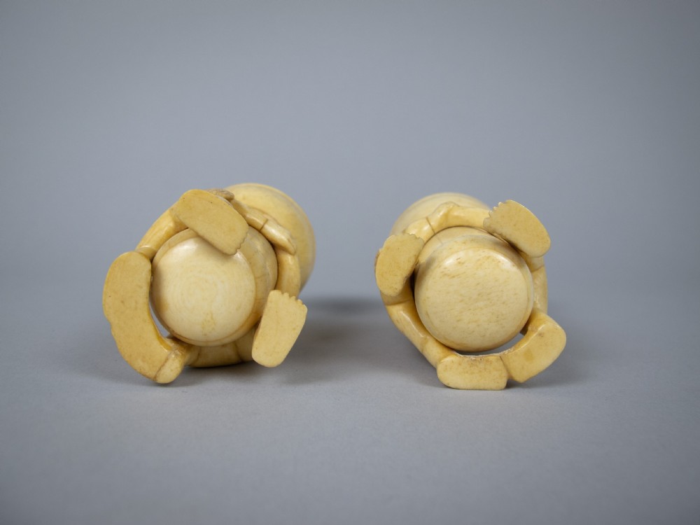 Unusual Pair of 19th Century Carved Bone Cherub Candle Holders. View XI