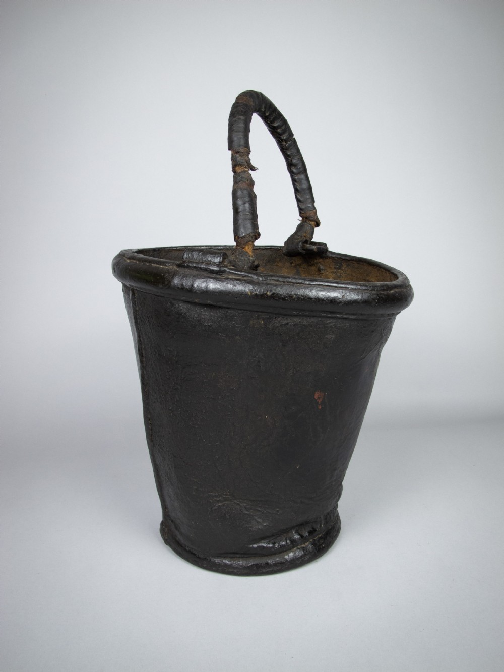 Sculptural George III Black Leather Fire Bucket, c.1790. View III