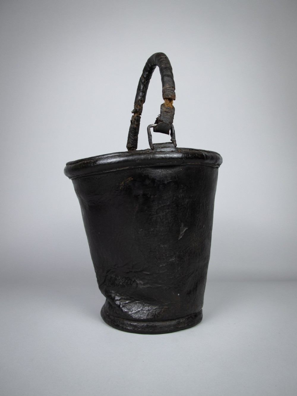 Sculptural George III Black Leather Fire Bucket, c.1790. View IV