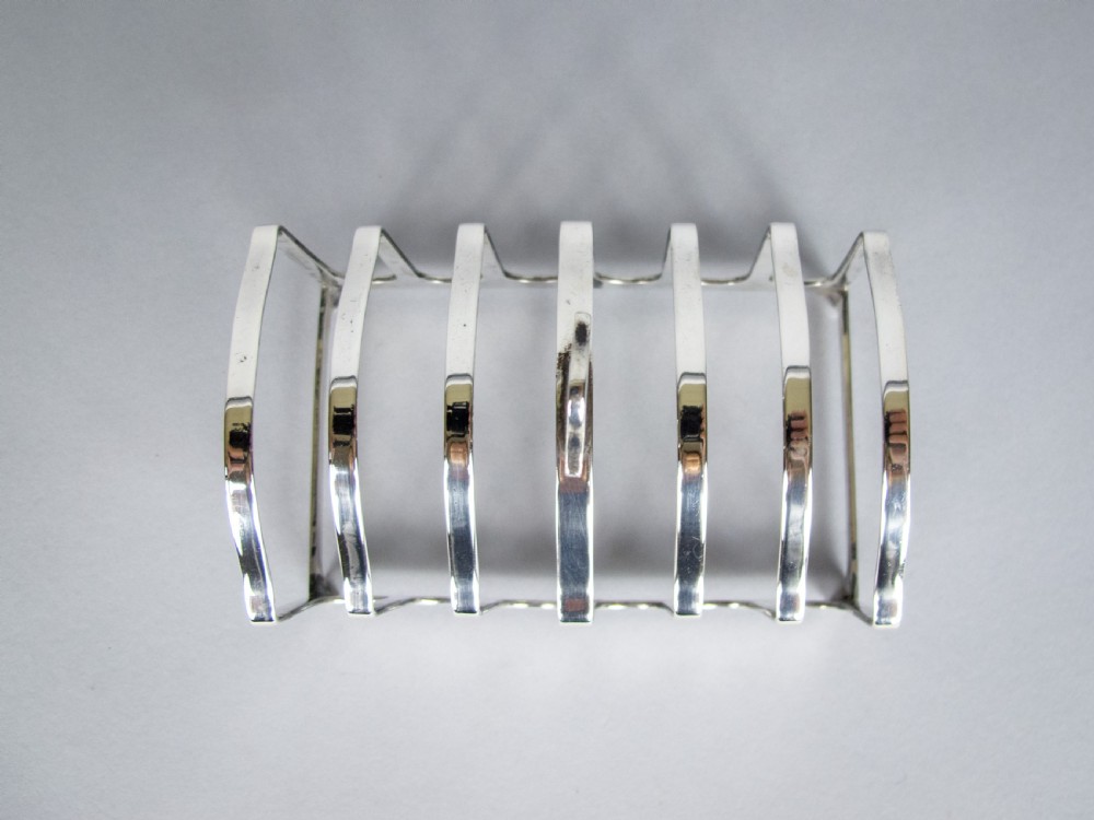 George V Sterling Silver 7 Bar Toast Rack by Adie Brothers, Birmingham, 1926 View V