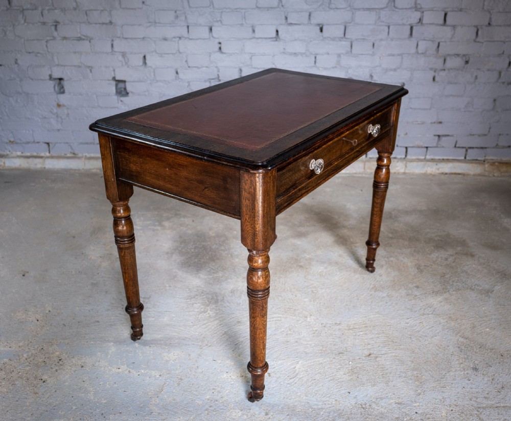 Mid Victorian Oak Writing Desk With Single Drawer, Key & Ceramic Castors.