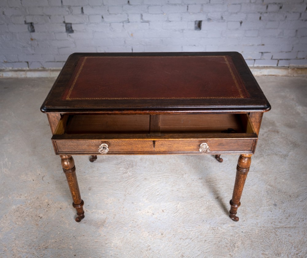 Mid Victorian Oak Writing Desk With Single Drawer, Key & Ceramic Castors. View III