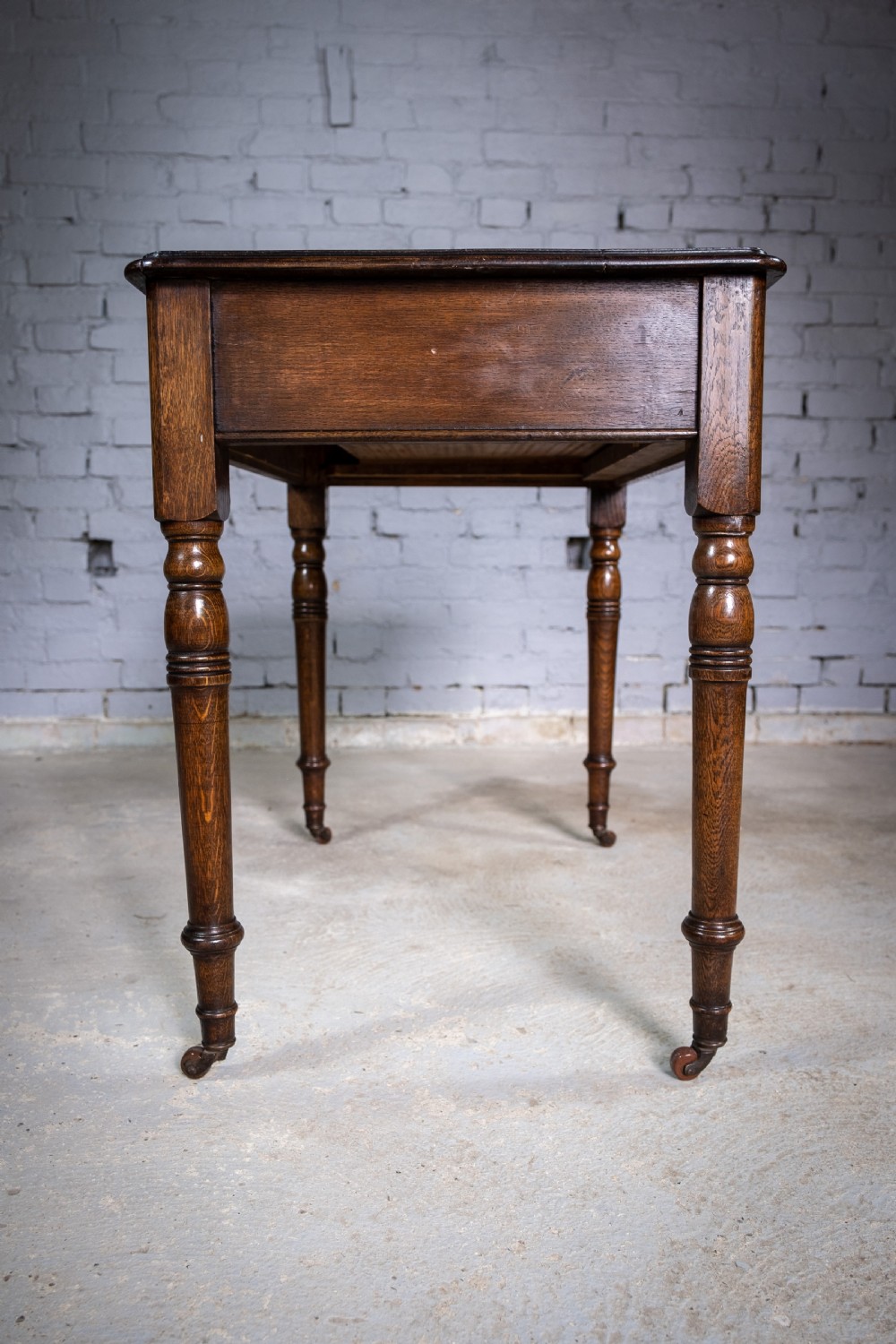 Mid Victorian Oak Writing Desk With Single Drawer, Key & Ceramic Castors. View XI