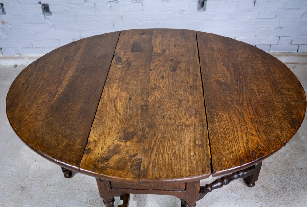 Early 18th Century English Oak Gate Leg Table With Central Drawer. View IV