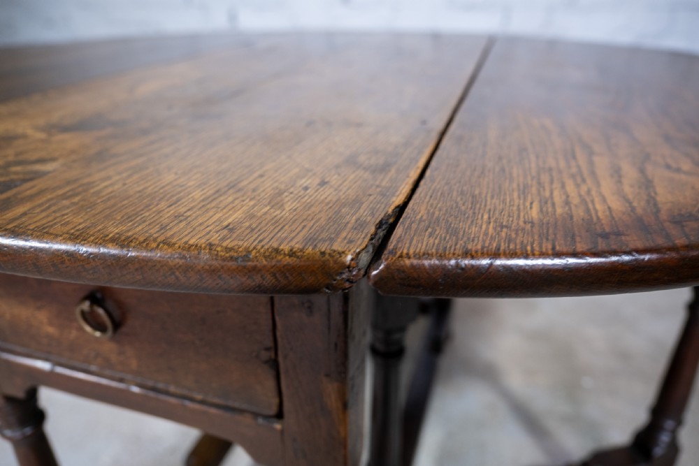 Early 18th Century English Oak Gate Leg Table With Central Drawer. View VI