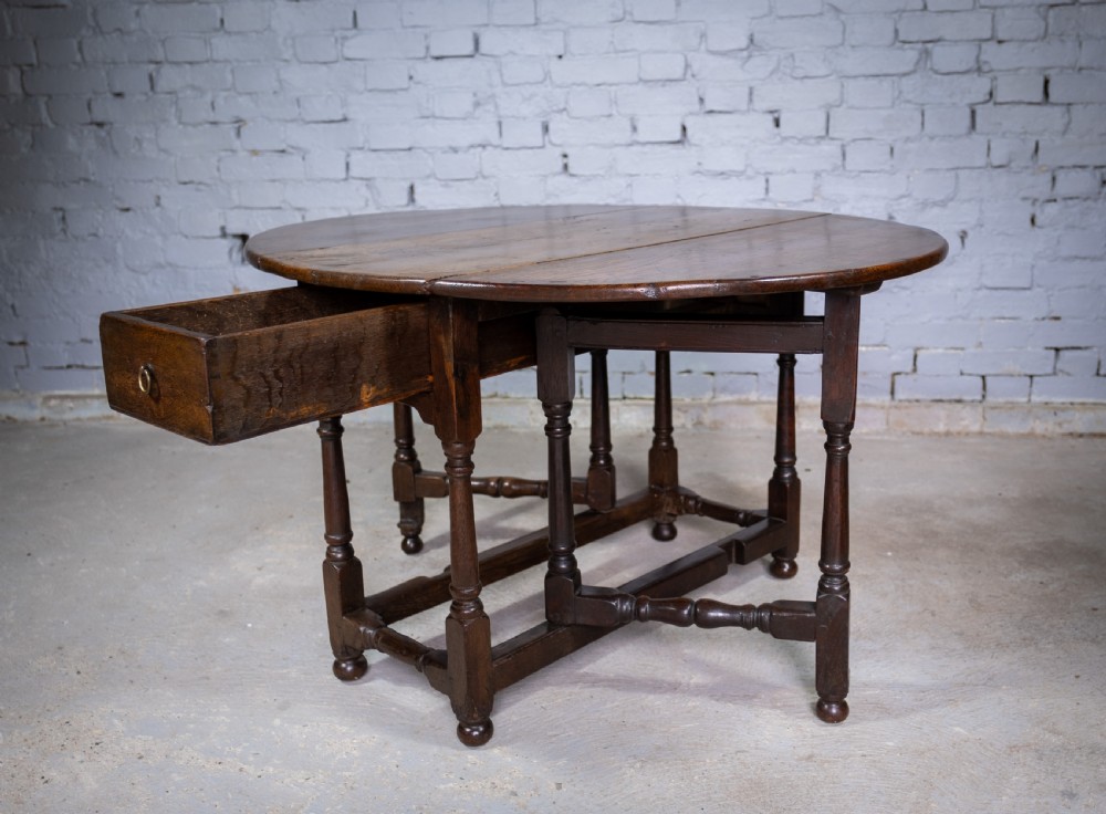 Early 18th Century English Oak Gate Leg Table With Central Drawer. View IX