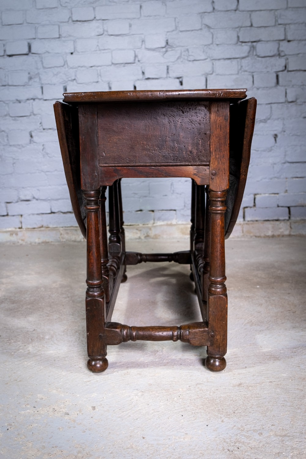 Early 18th Century English Oak Gate Leg Table With Central Drawer. View X