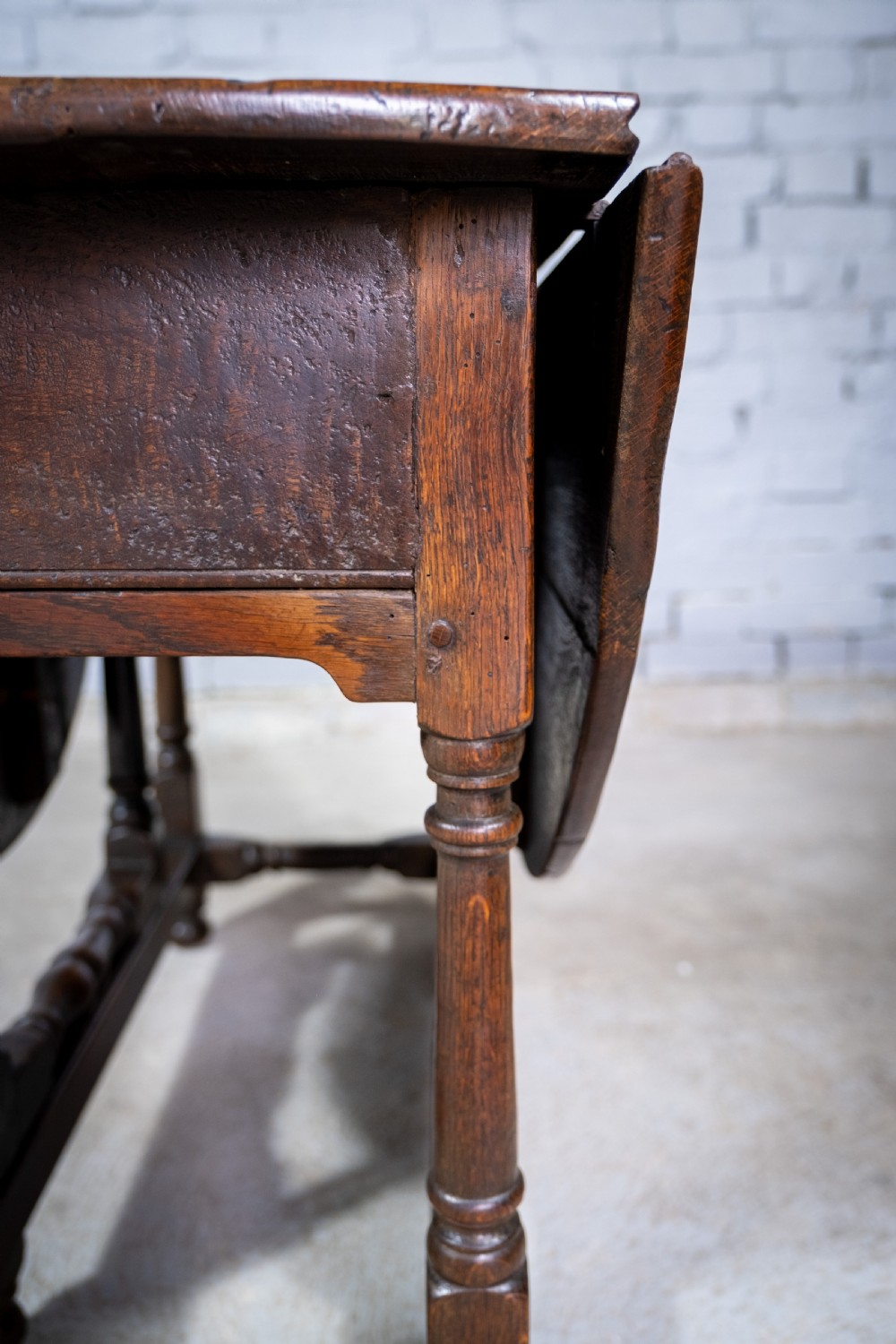 Early 18th Century English Oak Gate Leg Table With Central Drawer. View XI