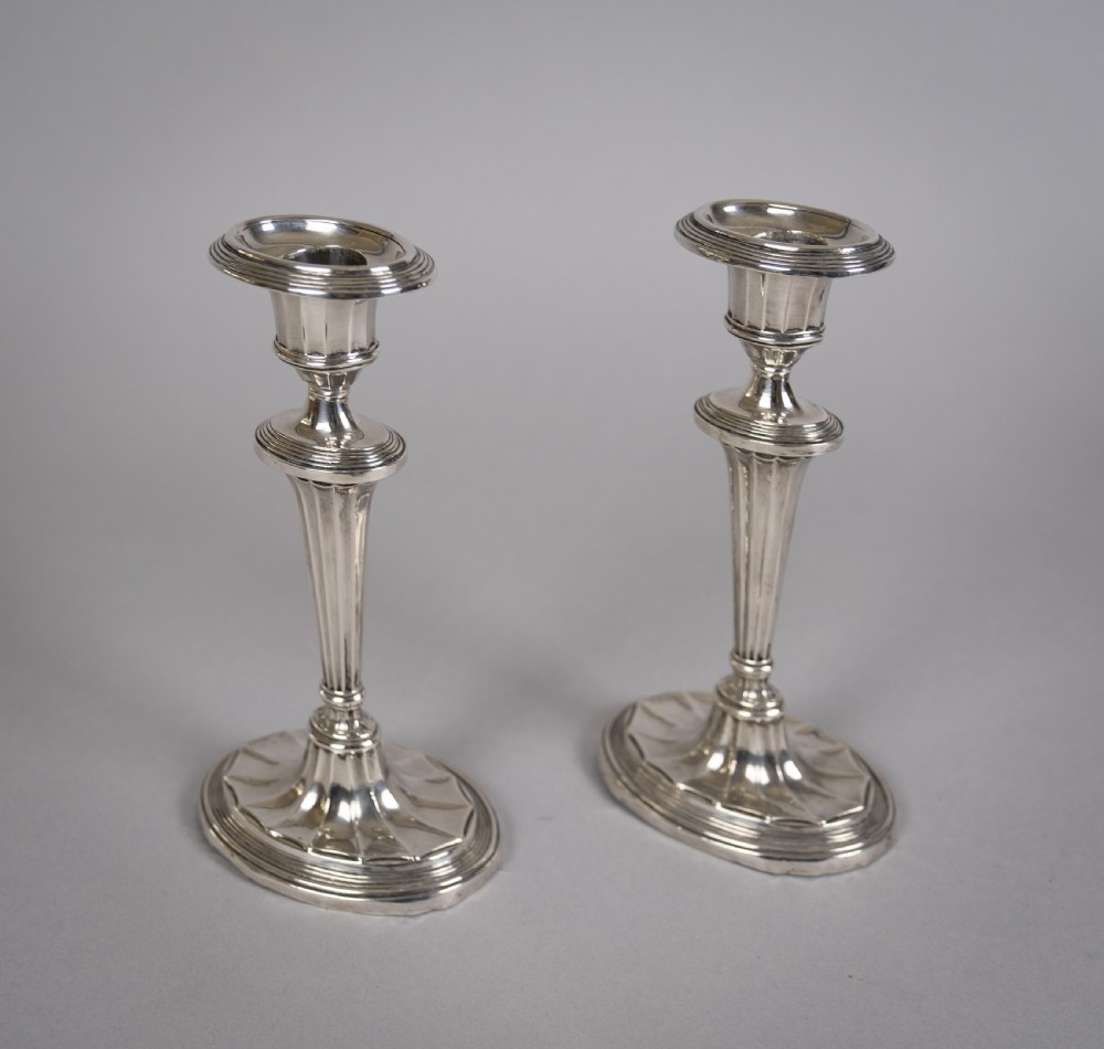 Pair Of Sterling Silver Neoclassical Candlesticks by Charles Boyton & Sons, 1911. View IV