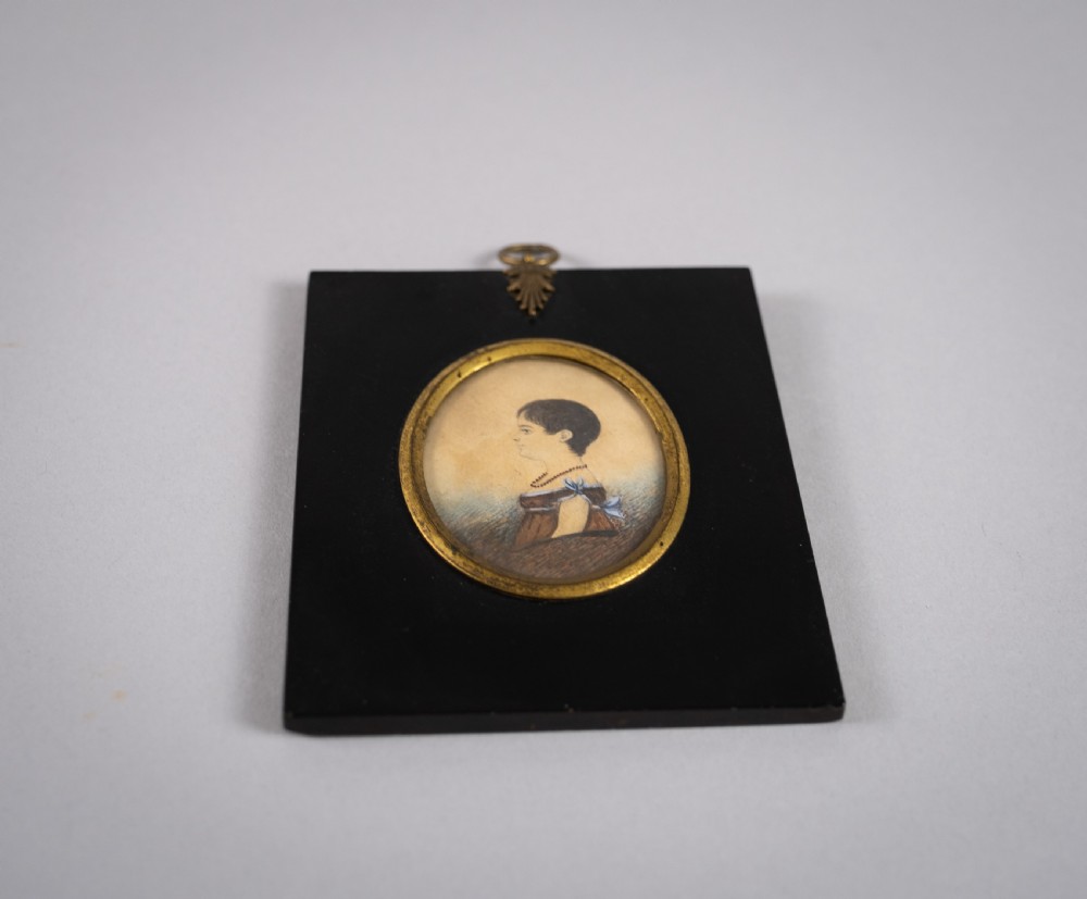 19th Century Miniature Portrait Of Small Girl In Red & Blue Dress. View III