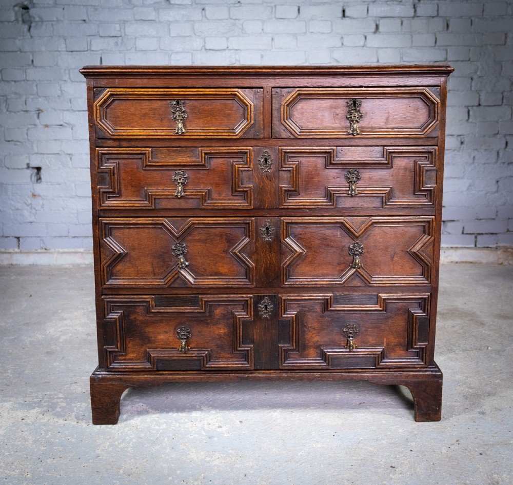 18th Century & Later Geometric Oak Chest Of Drawers. View II