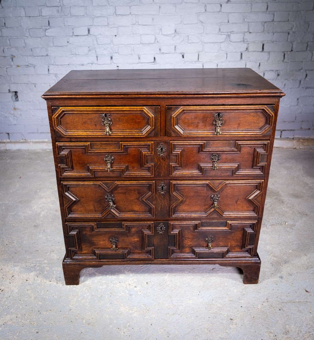 18th Century & Later Geometric Oak Chest Of Drawers. View III