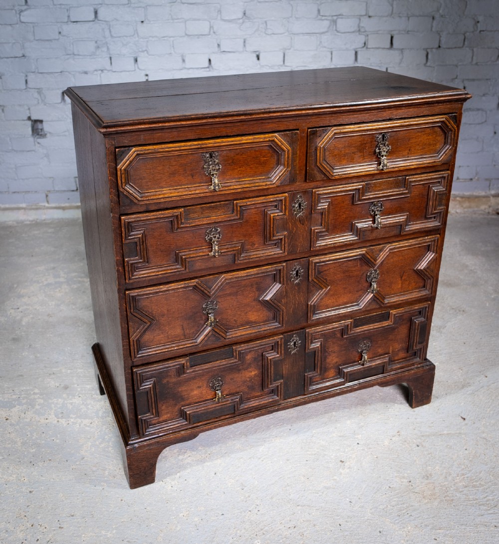 18th Century & Later Geometric Oak Chest Of Drawers. View IV
