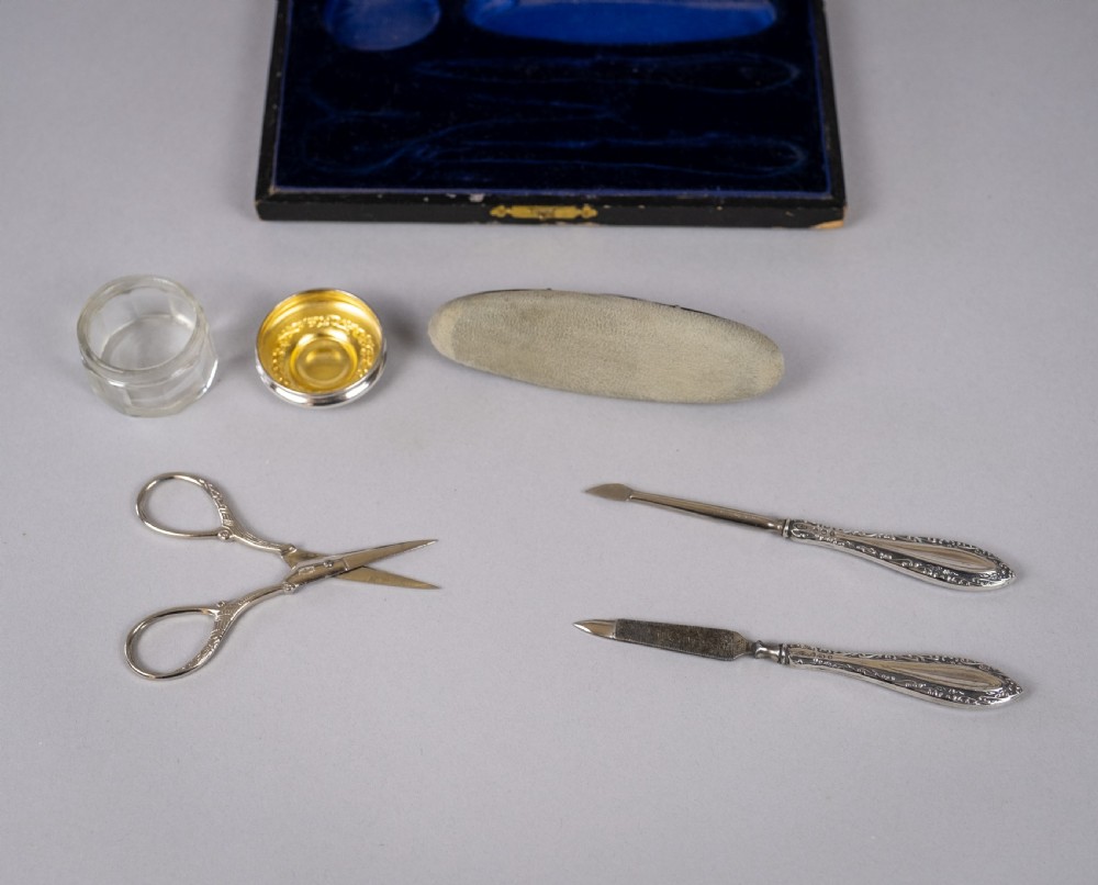 Sterling Silver Manicure Set by William Devenport, Birmingham, 1915. View V