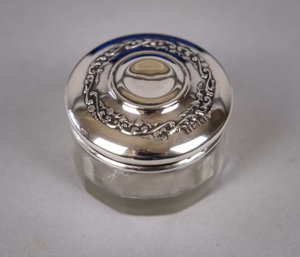 Sterling Silver Manicure Set by William Devenport, Birmingham, 1915. View IX