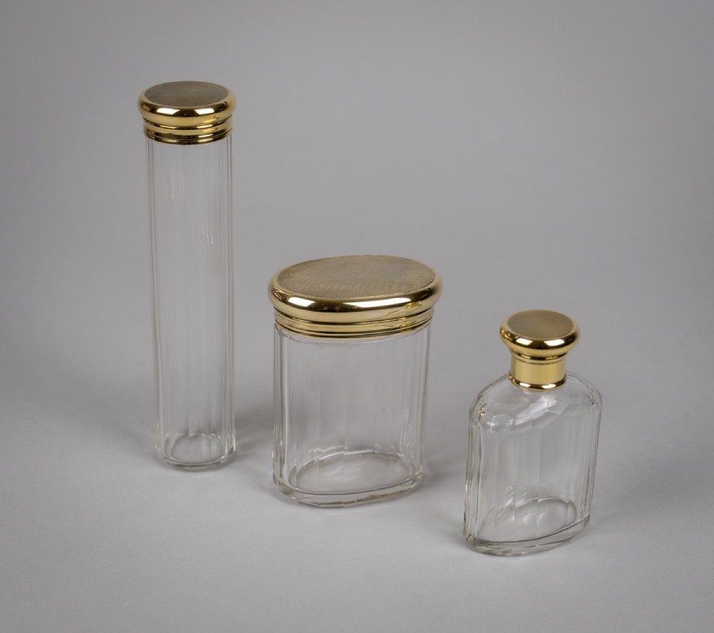 B & G West, London, 1942, Three Silver Gilt Dressing Table Jars .