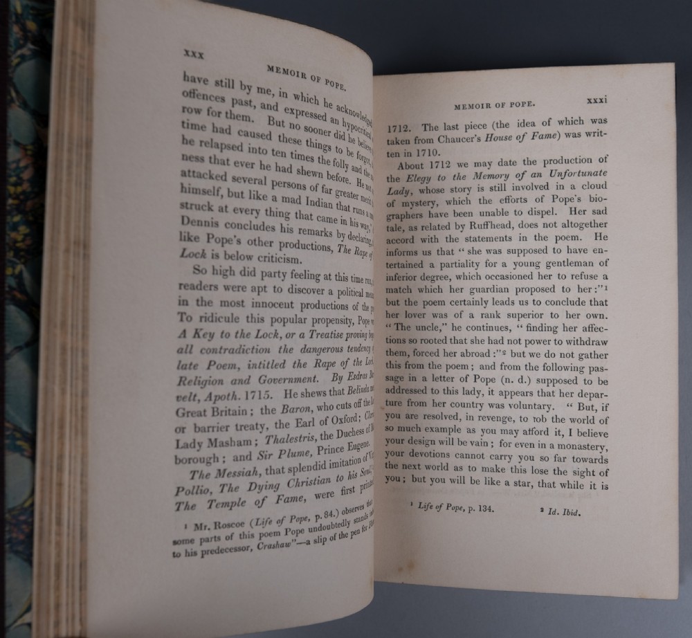 A three-volume set of 1835 leather-bound books by Alexander Pope with dark spine labels and gilt lettering. View X