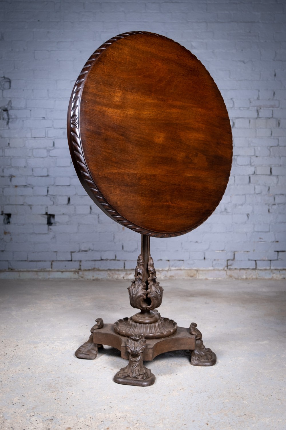 19th Century Cast Iron Tilt Table With Later Flame Mahogany Top. View II