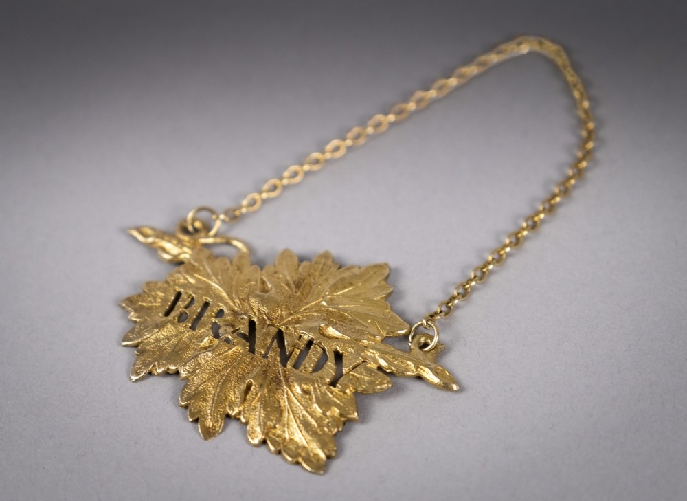 Four Silver Gilt Vine Leaf Decanter Labels by SMD, London, 1968. View II