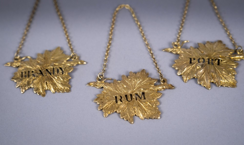 Four Silver Gilt Vine Leaf Decanter Labels by SMD, London, 1968. View III