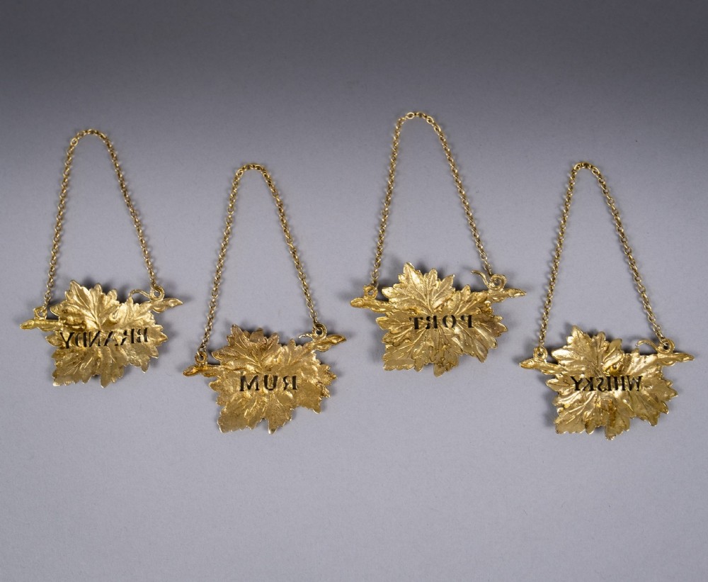 Four Silver Gilt Vine Leaf Decanter Labels by SMD, London, 1968. View VII