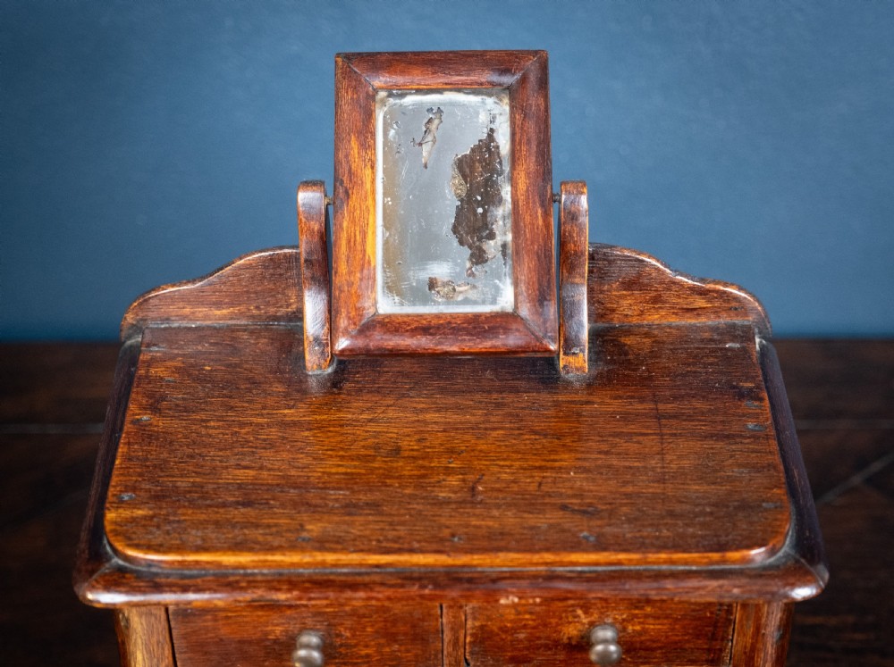 Miniature Early 19th Century Oak Chest Of Drawers With Swing Mirror View VI