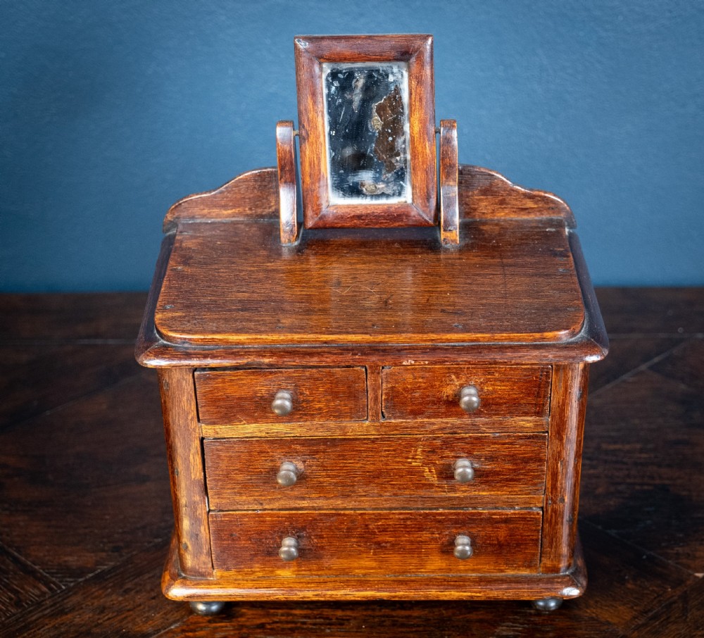 Miniature Early 19th Century Oak Chest Of Drawers With Swing Mirror View IX